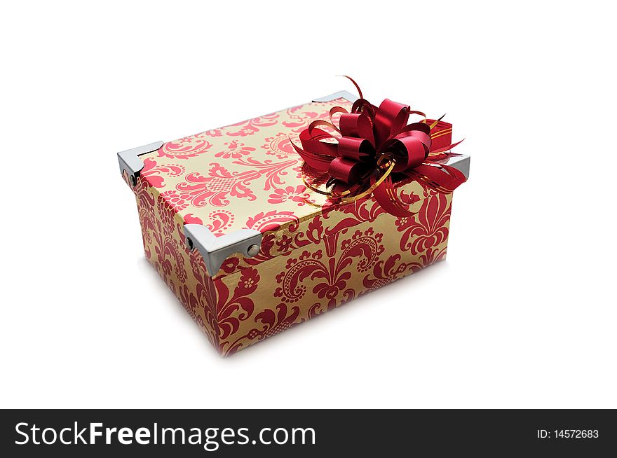 Isolated bright gift box with a red bow on it