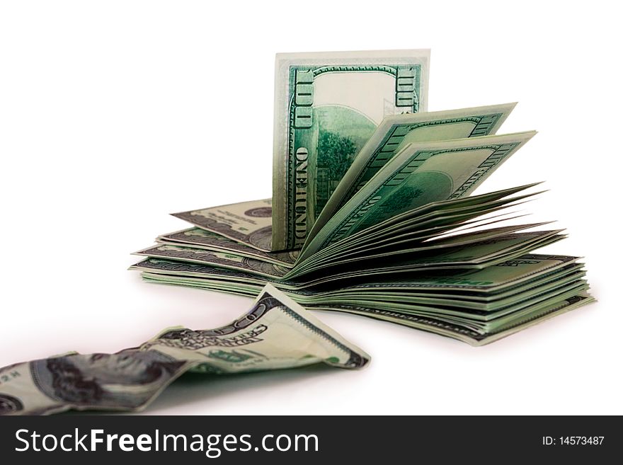 A pile of hundred-dollar bills and the old bill isolated on a white background