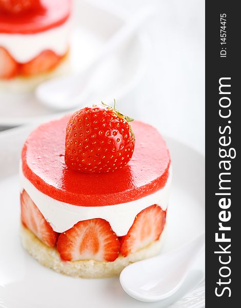 Dessert -cake with strawberries on a white background. Dessert -cake with strawberries on a white background