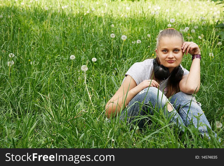 Girl listen music. outdoor shot