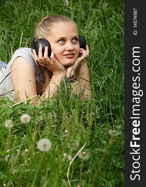 Girl listen music. outdoor shot