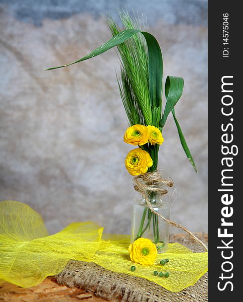 Still-life - bouquet with flowers in phial