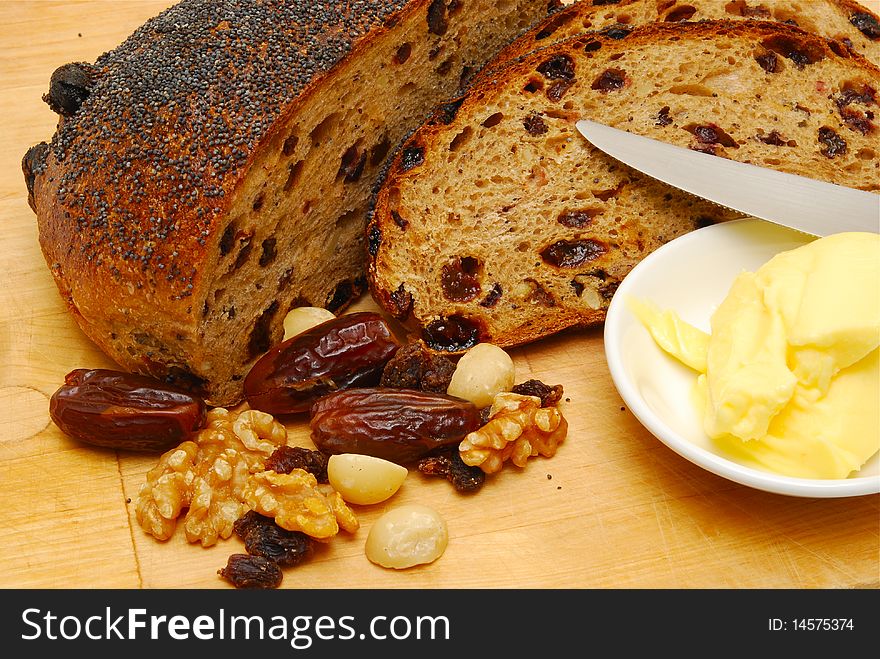 Fresh raisin toast with butter and knife