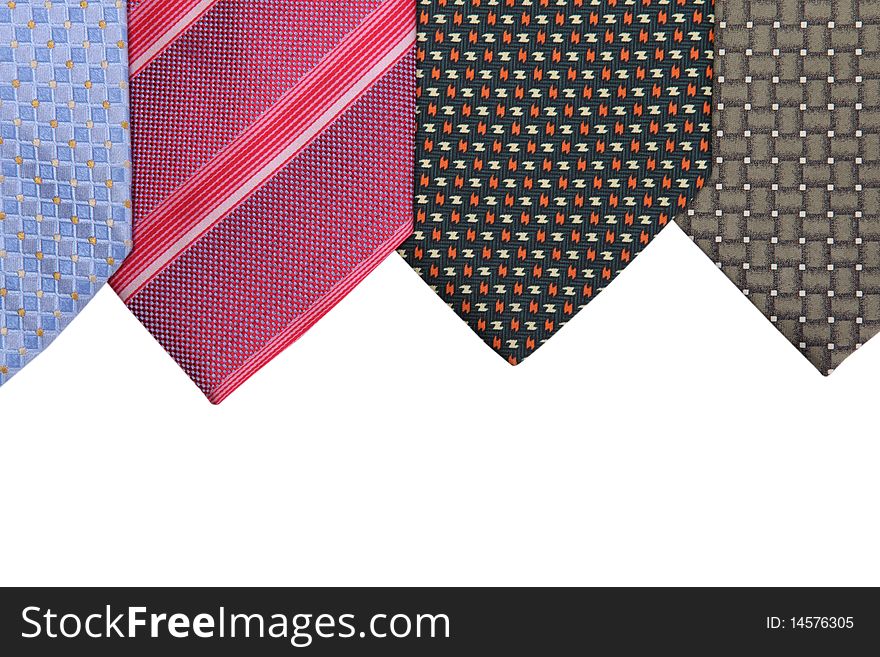 Blue, magenta, brown and black elegance ties on white background. Close up image