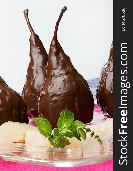 Still image of two chocolate pears