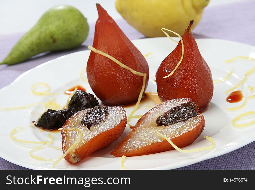 Still image of filled pear in red vine. Still image of filled pear in red vine