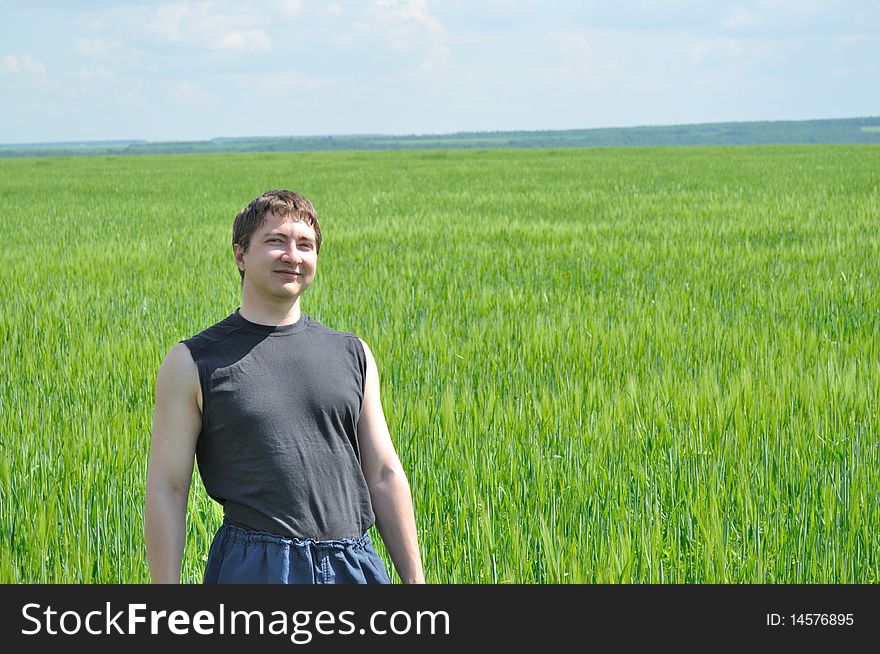 The Field Of Green Wheat, And A Man On It