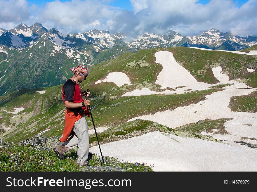 Hiker boy in Caucasus mountains