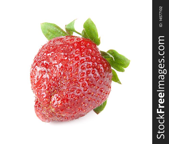 Ripe berry of the strawberries with green sheet on white background