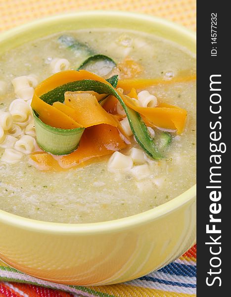 Cream vegetable soup with small pasta