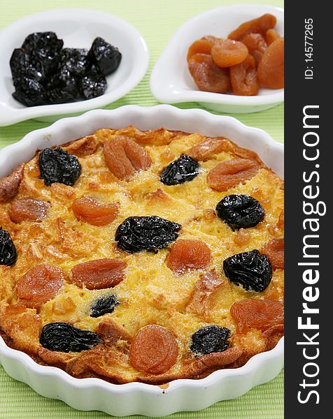 Clafoutis baked French dessert with plums and apricots