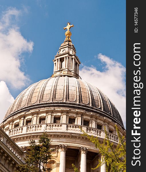 A view of the famous dome, topped by a golden cross, St Paul's Cathedral London. A view of the famous dome, topped by a golden cross, St Paul's Cathedral London.