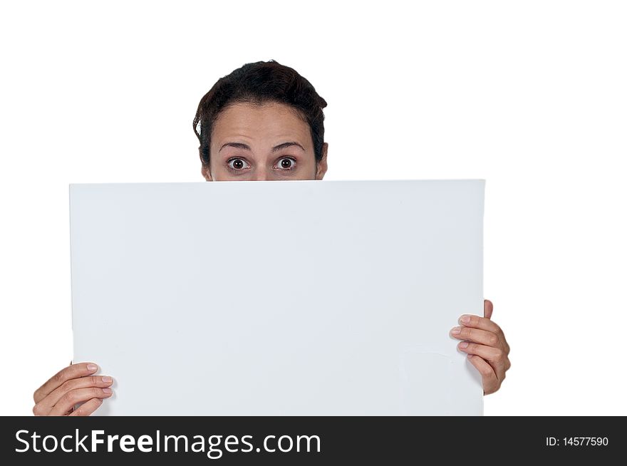 Portrait of woman's eyes peeking out from behind white sign. Portrait of woman's eyes peeking out from behind white sign