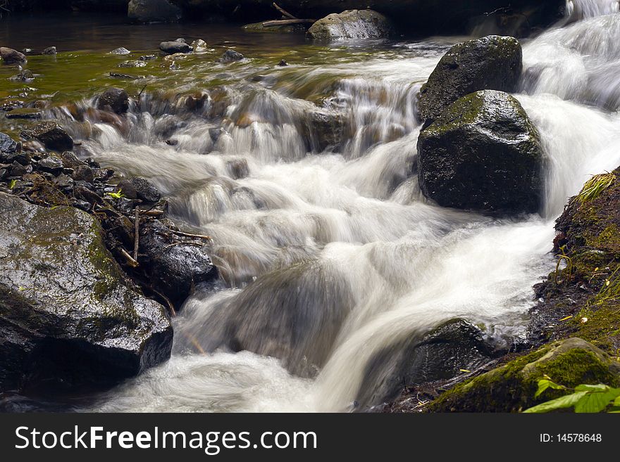 Beautiful waterfalls in the rocky river bed. Beautiful waterfalls in the rocky river bed.