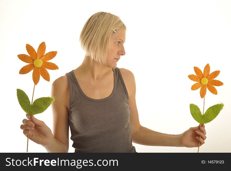 Woman selecting a flower between 2 of them