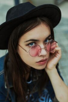 Portrait Of Attractive Young  Woman In Stylish Glasses Stock Photo