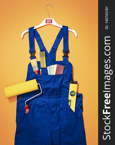 Painter and decorator work uniform with tools