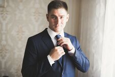 Young Handsome Man Relaxing At His Apartment In A Hotel After Business Meeting Stock Image