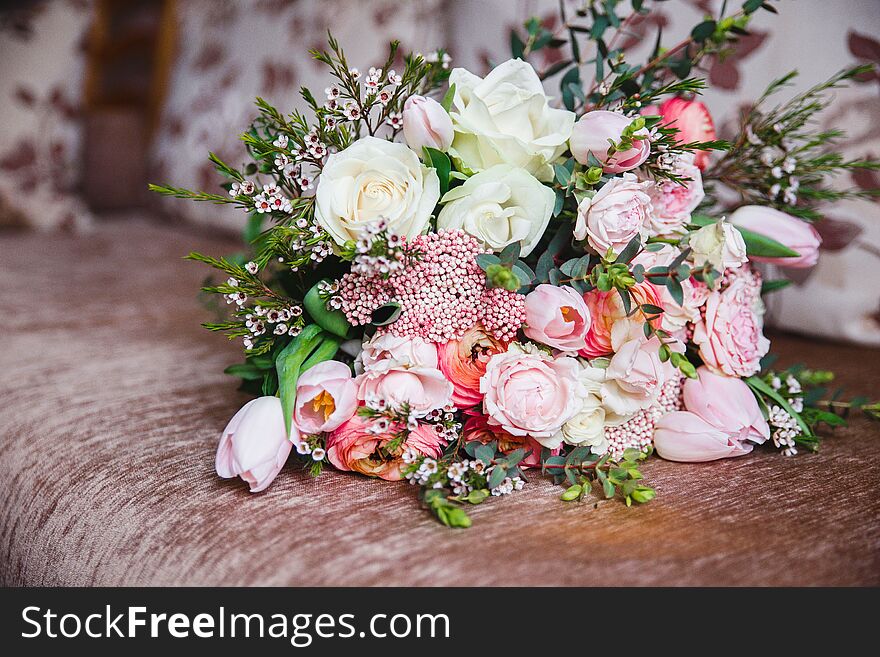 Beautiful wedding bouquet of mixed flowers in vase . the work of the florist at a flower shop. copy space