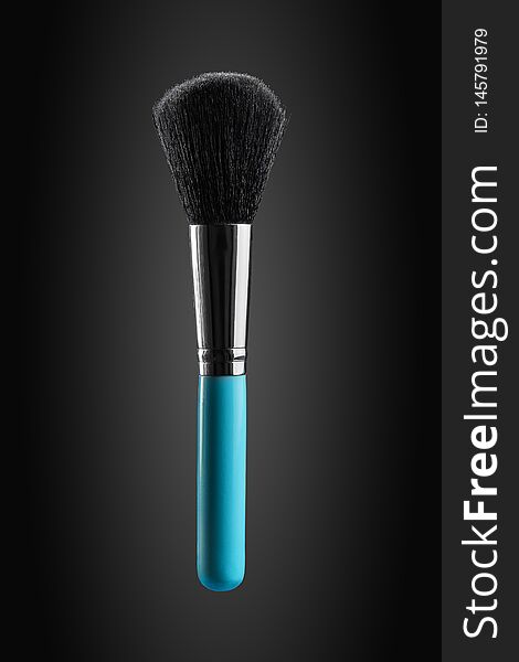 Fluffy, wide and soft powder brush new clean with blue handle promotional photo.