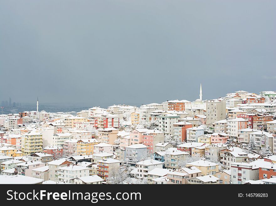 A Winter View From The City Of Istanbul With Houses Covered With Snow