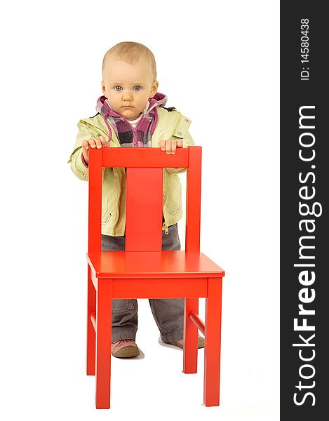 Cute Baby With A Little Red Chair