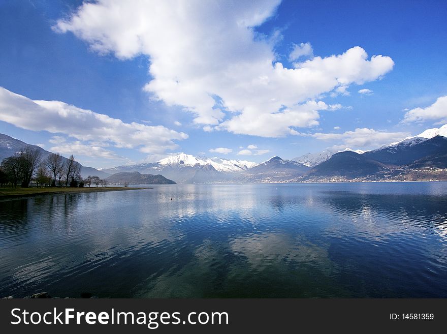 Lake with trees and grass on the banks