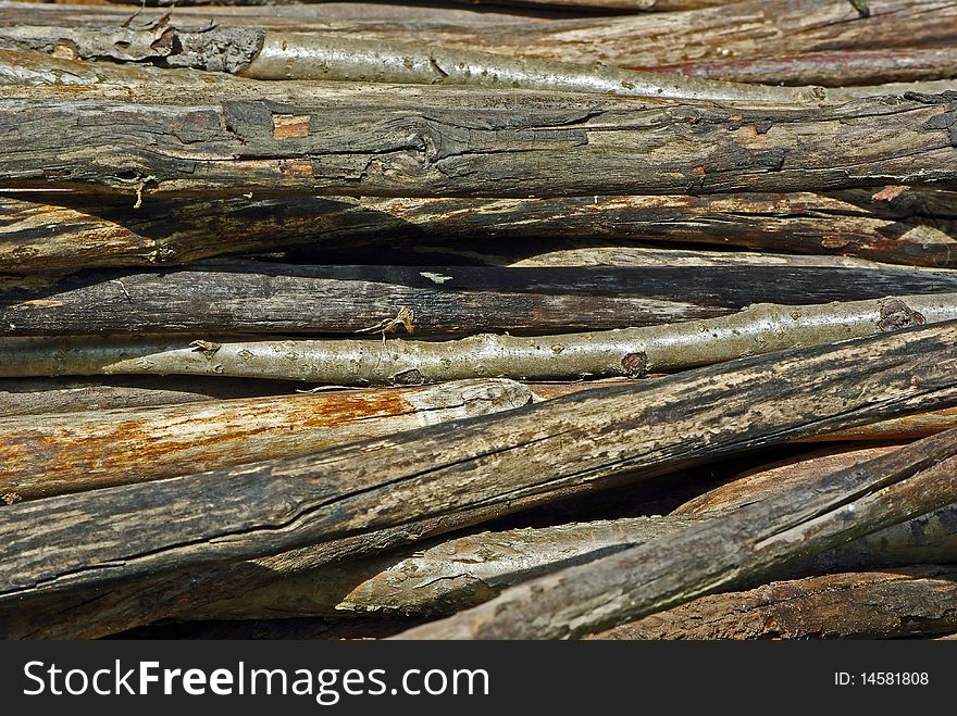 Old wooden wethered sticks as background
