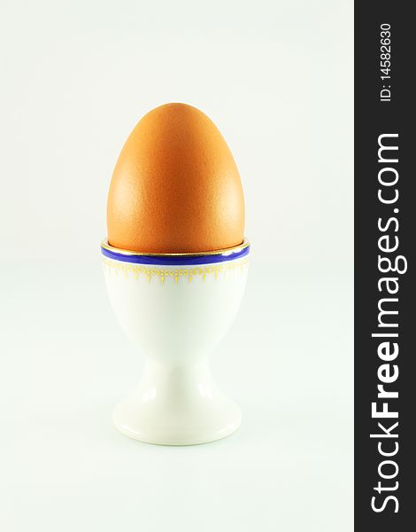 Egg in a cup of egg,  isolated