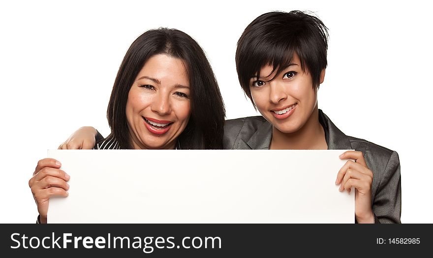 Multiethnic Mother And Daughters With Blank Sign