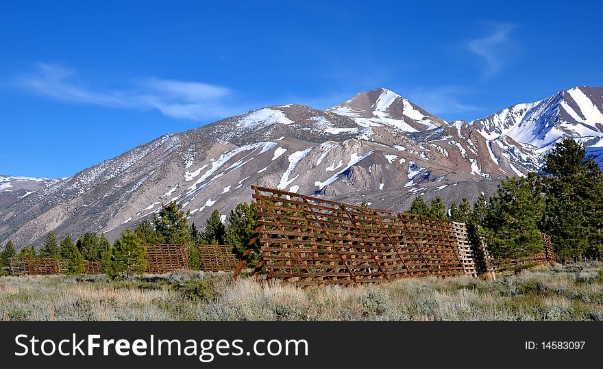 A parallel series of snow fences near Mammoth Lakes, CA.