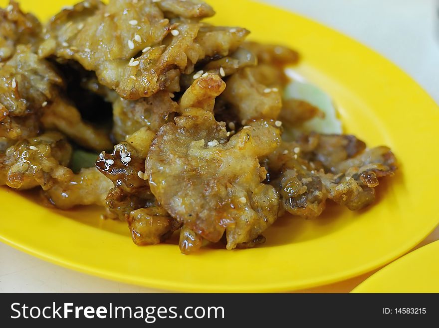 Deep fried mushroon delicacy made from abalone mushrooms. Concepts such as food and beverage, and travel and cuisine, and diet and nutrition.