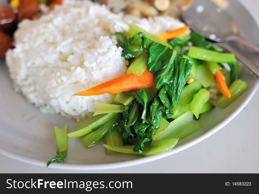 Chinese simple vegetable set meal with rice. Suitable for concepts such as diet and nutrition, healthy lifestyle, and food and beverage.