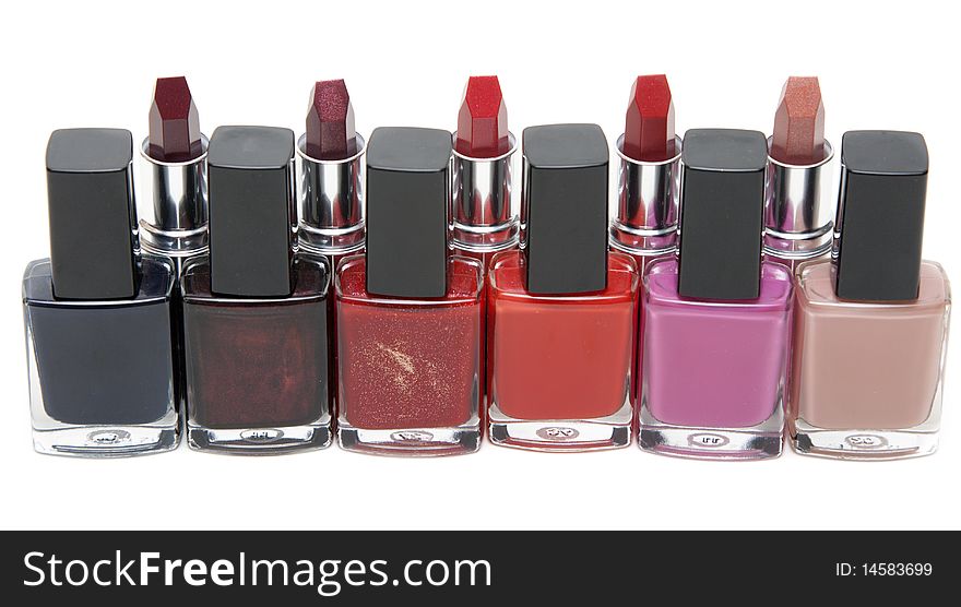 Lipstick and bark for nail on white background