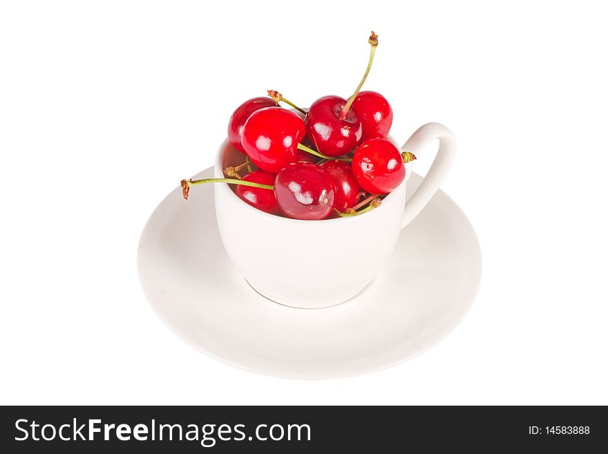 Cherry in cup isolated on the white background