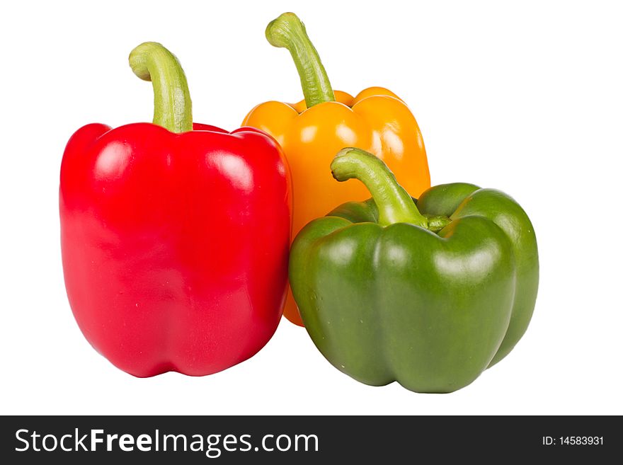 Three colorful pepper isolated in white