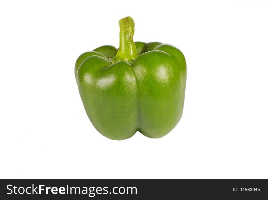 Single green sweet pepper isolated on the white background