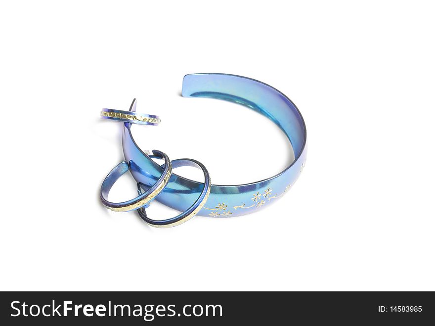 Blue bracelet, earrings and ring isolated on white background. Blue bracelet, earrings and ring isolated on white background