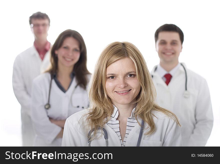 Smiling medical doctors with stethoscopes. Isolated over white background