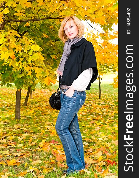 Portrait of woman in autumn forest. Portrait of woman in autumn forest