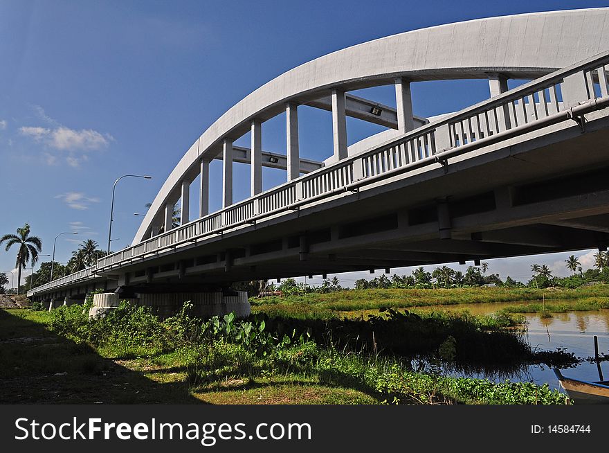 Curved bridge cross the river. Curved bridge cross the river