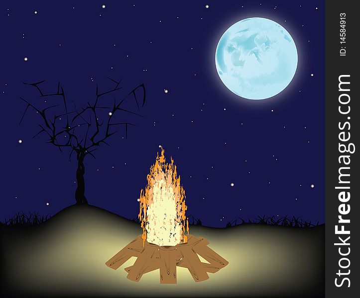 Night fire on a glade, against the night sky with the full moon