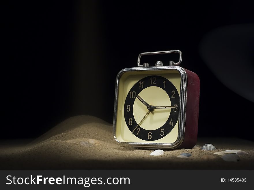 Old clock drowning in sand. Old clock drowning in sand