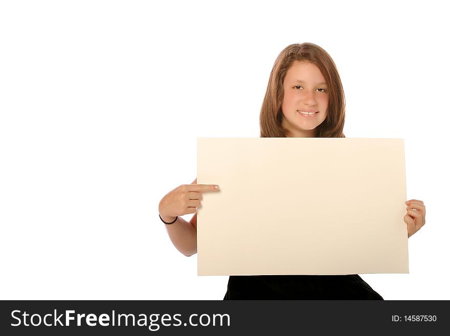 Young teen girl holding a blank board on an isolated background. Young teen girl holding a blank board on an isolated background