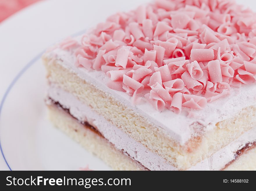 Close up of freshly made cake on white plate