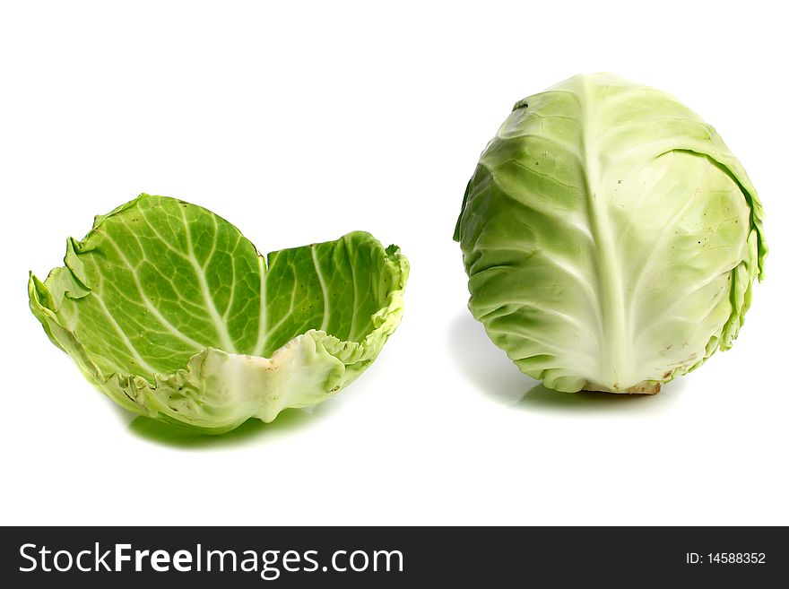 Cabbage and leaf isolated on white background