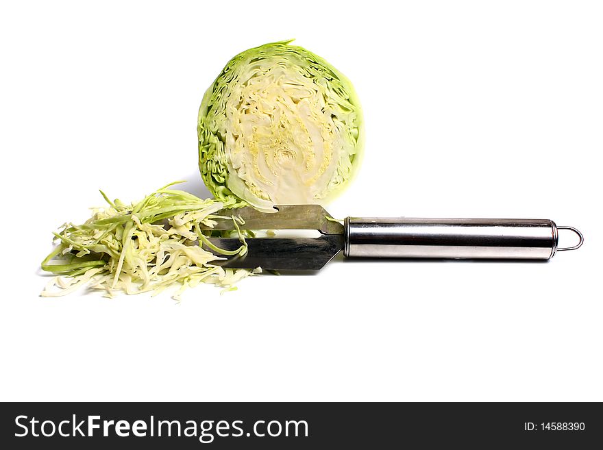 Cut cabbage and knife isolated on white background