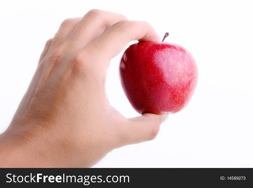 Red apple on man hand over white background. Concepts: Nutrition, Food, Health & Wellness