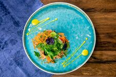 Salad With Ripped Duck, Spicy Pumpkin And Citrus Sauce. European Cuisine. The Work Of A Professional Chef. Dish From A Restaurant Royalty Free Stock Photo