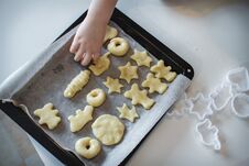 Two Children Put Cookies On A Baking Sheet. Homemade Desserts. The View From The Top Stock Photography Two Children Put Cookies On A Baking Sheet. Homemade Desserts. The View From The Top Stock Photography